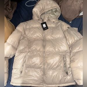 Tan/cream colored puffer jacket